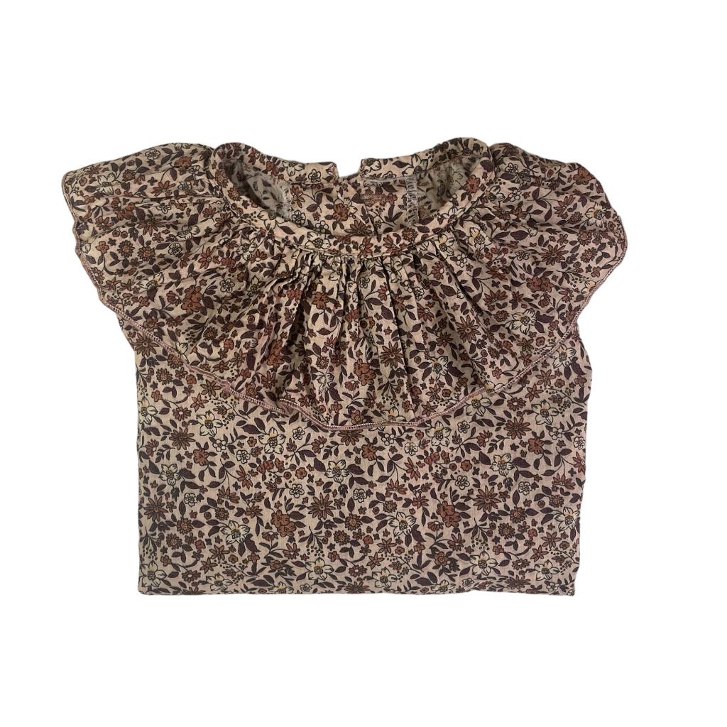 BLUSA VOLANTON MANGA LARGA FLOR CASTAÑO